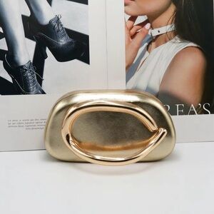 Gold Metallic Statement Clutch Bag with Sculptural Accent